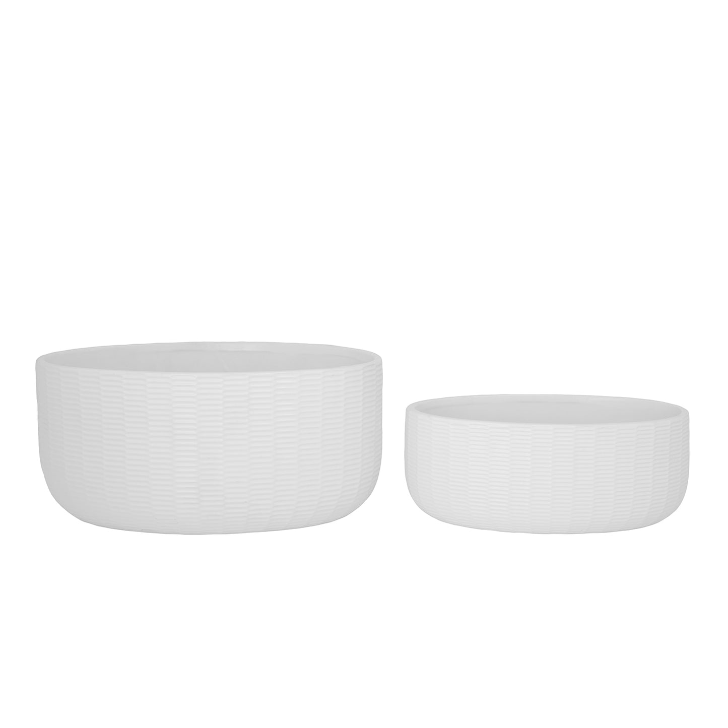 Two white ceramic bowls of different sizes on a white background
