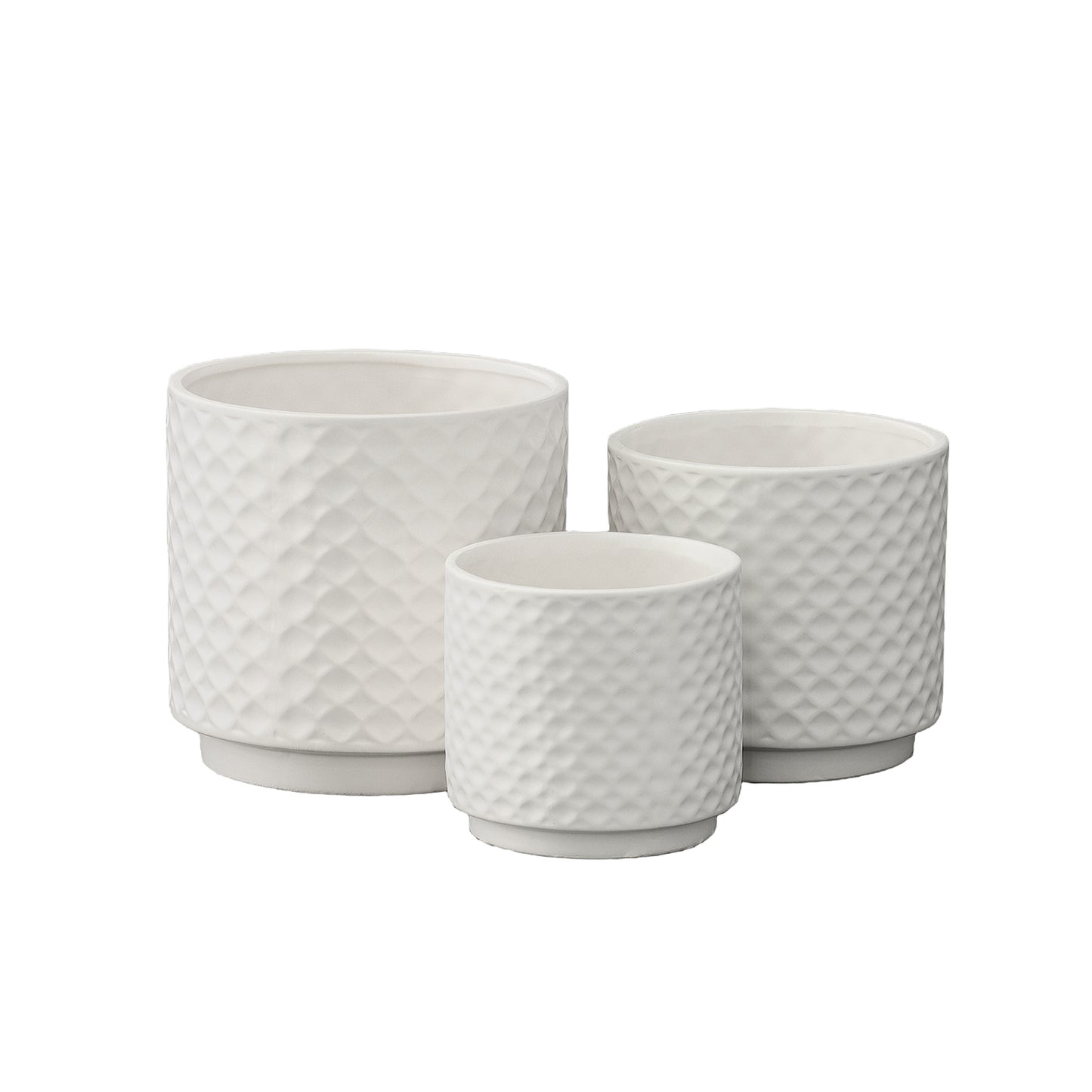 Three white ceramic planters with a geometric pattern on a white background