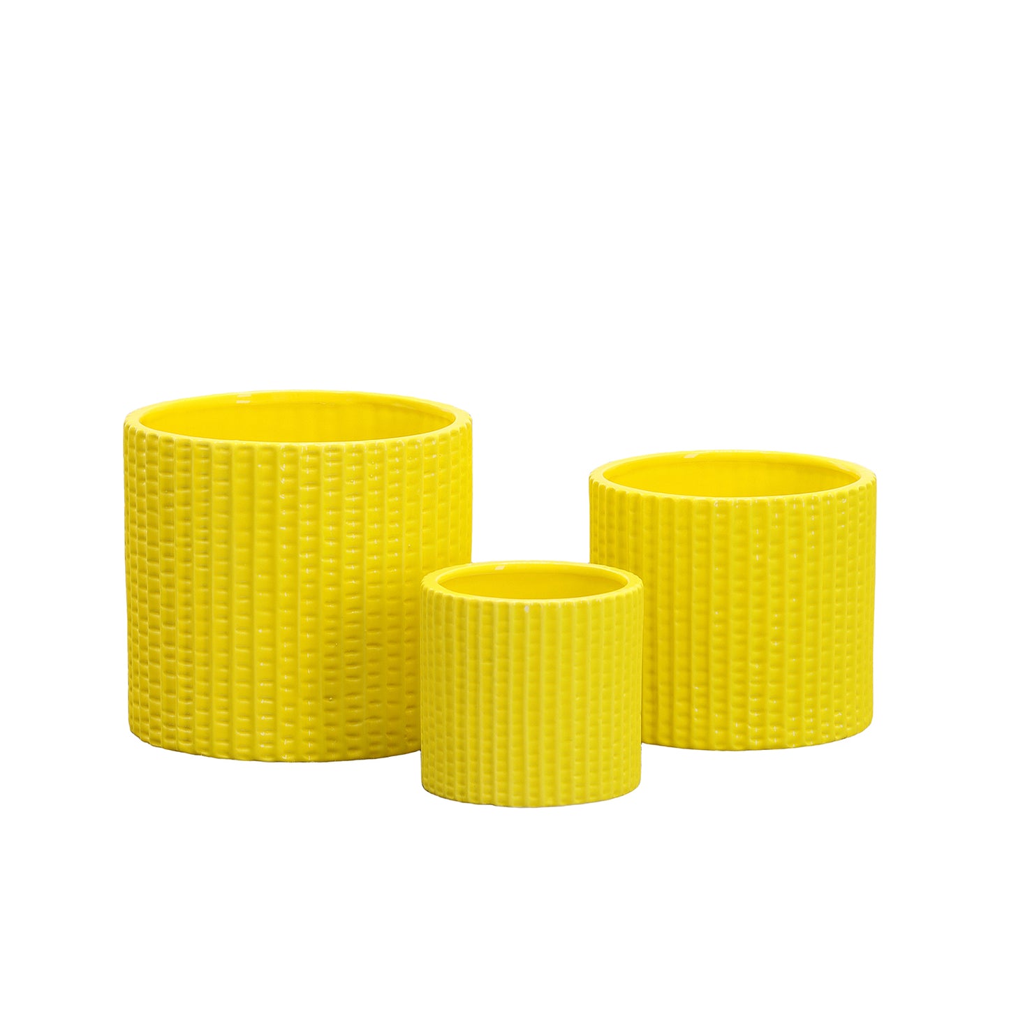 Three yellow woven planters of different sizes on a white background