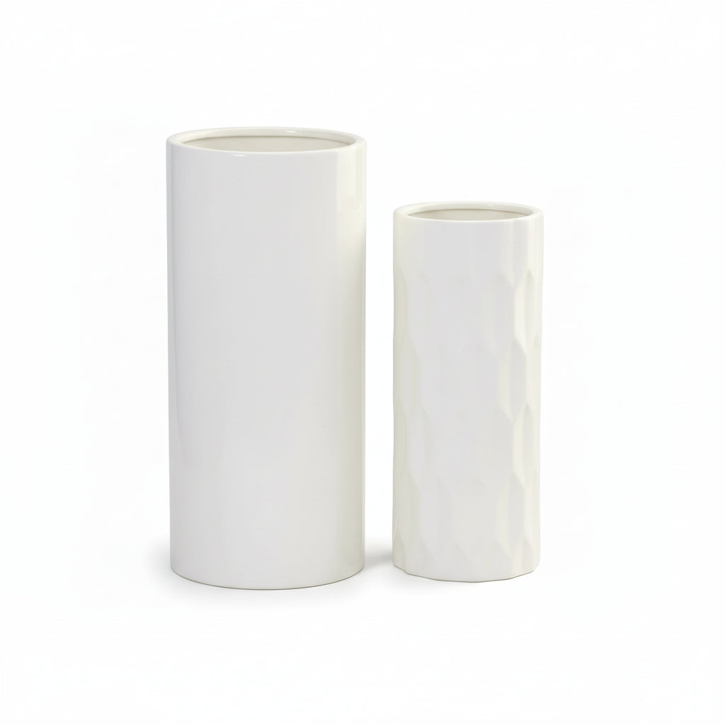 Two white cylindrical vases on a white background