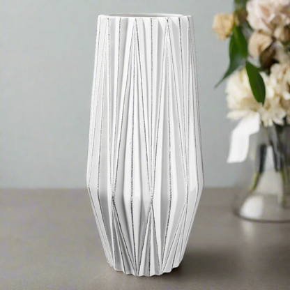 White textured vase on a neutral background