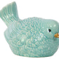 A glossy finish porcelain figurine of a teal blue bird.