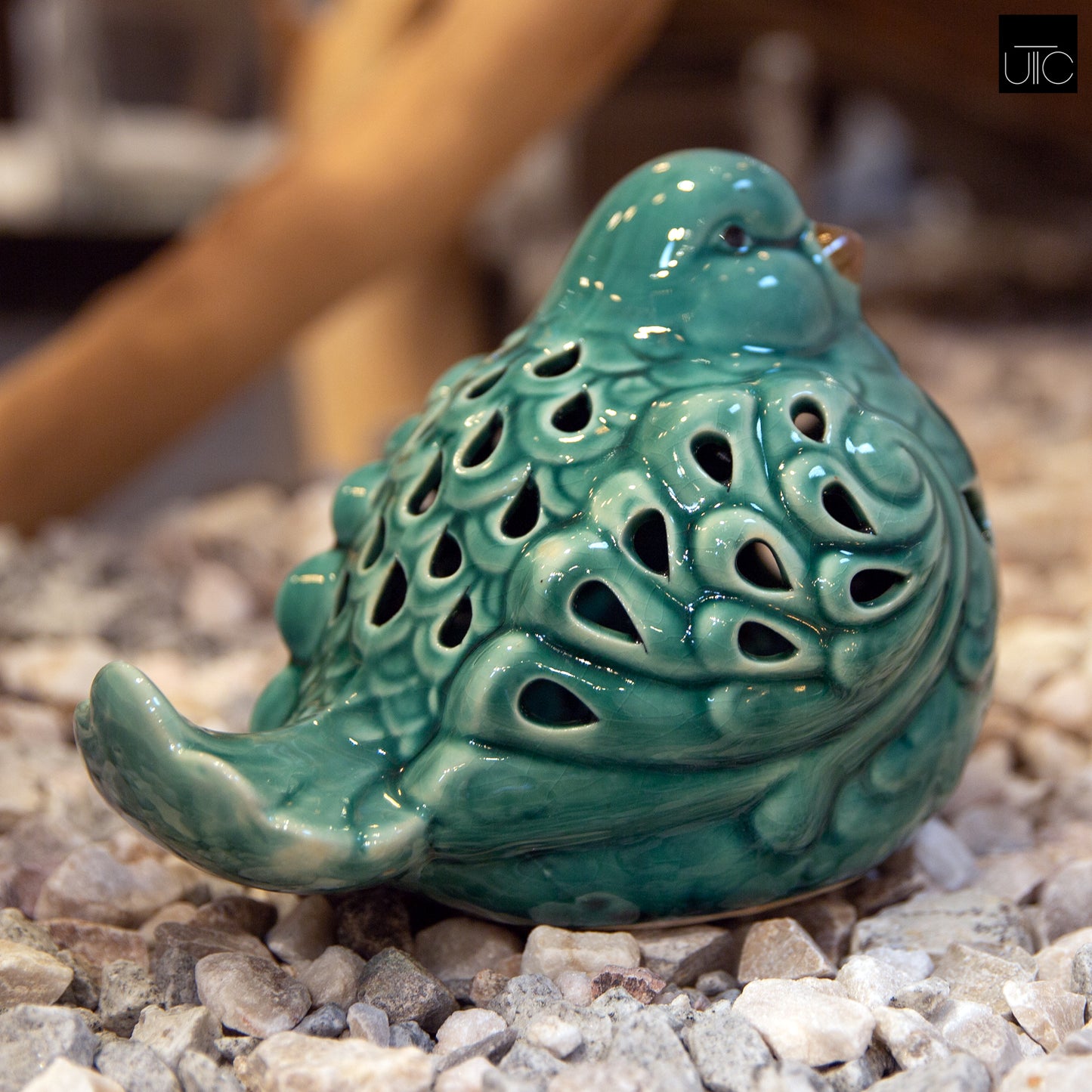 Ceramic Sitting Bird Figurine with Brown Beak and Cutout Design Body Gloss Finish