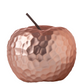 Copper apple with a textured surface on a white background