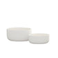 Two white textured planters on a white background