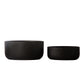 Two black textured planters on a white background