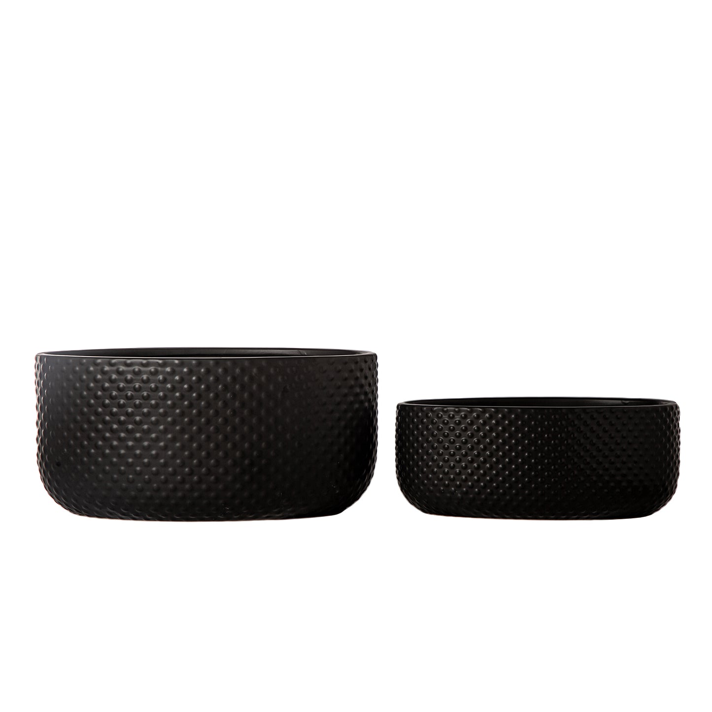 Two black woven bowls on a white background