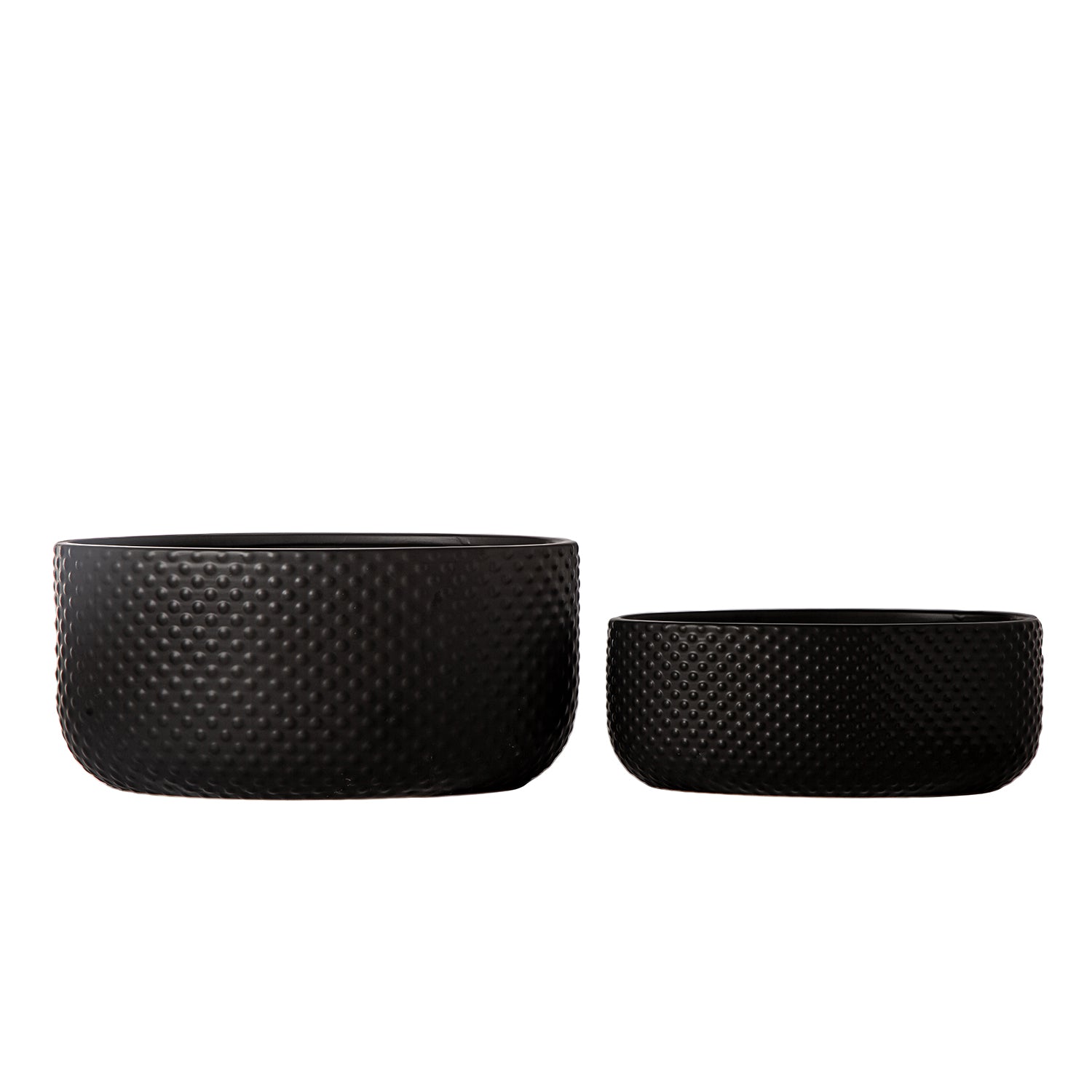 Two black woven bowls on a white background