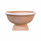 A terracotta-colored ceramic planter bowl with a pedestal base, shown against a plain white background.