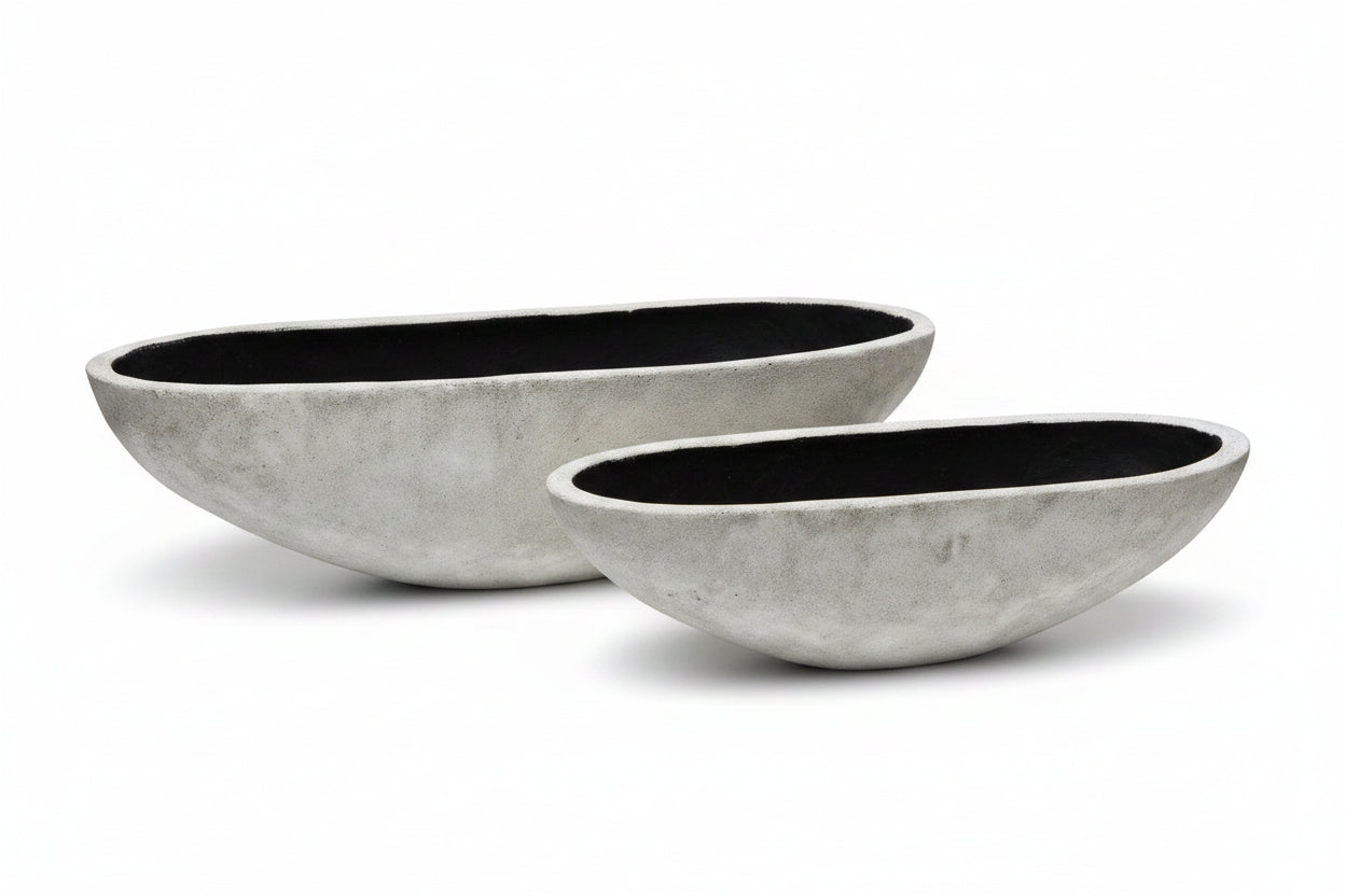 Two gray oval pots on a white background