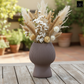 Zoryana Sculpted Stoneware Pot with Pedestal Base