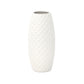 A white ceramic round vase with a wide mouth, diamond engraved body, and a matte finish.