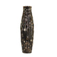 Decorative vase with a textured surface on a white background