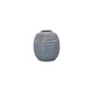 A blue ceramic vase with a glossy finish and a ribbed texture, displayed against a white background.