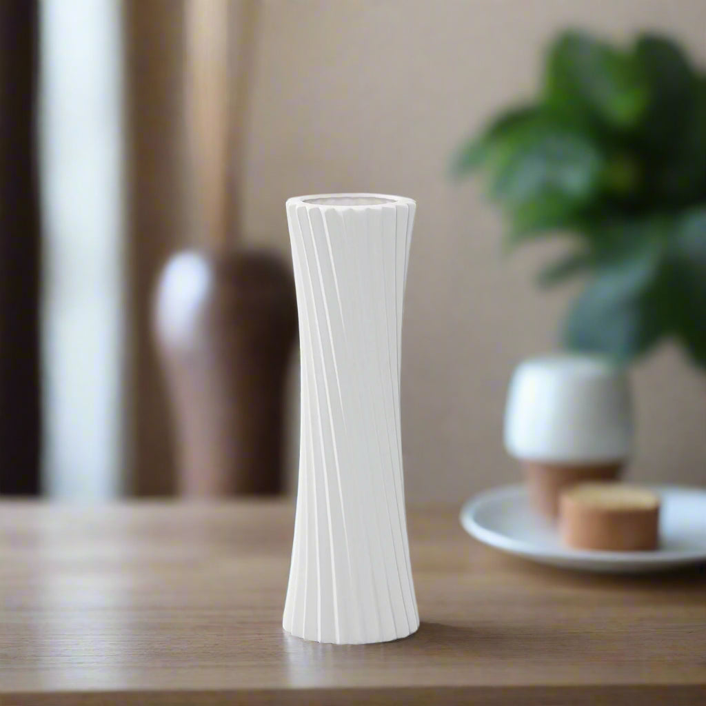 White textured vase on a white background
