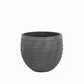 A dark gray textured planter pot with a ribbed, honeycomb-like exterior design, shown against a plain white background.